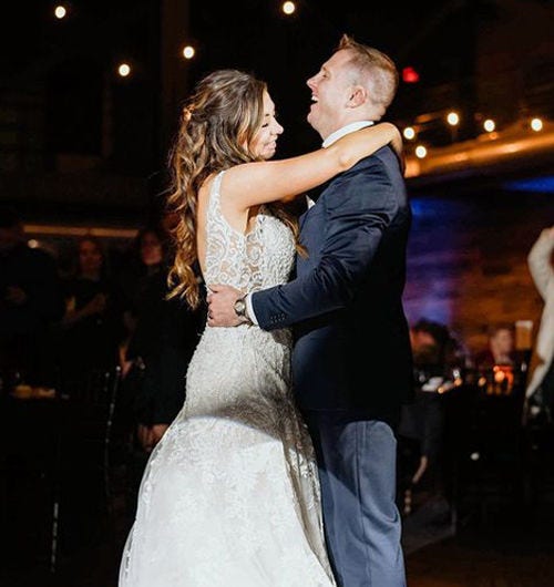 Maryville Online nursing student Lexy dances with her husband at their wedding.